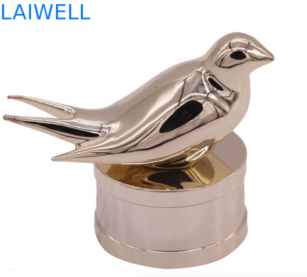 Amostra grátis luxuosa personalizada das partes superiores da garrafa de perfume do chapeamento de ouro do projeto do pássaro
